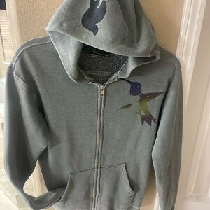 Woman’s Free City zip hooded sweatshirt